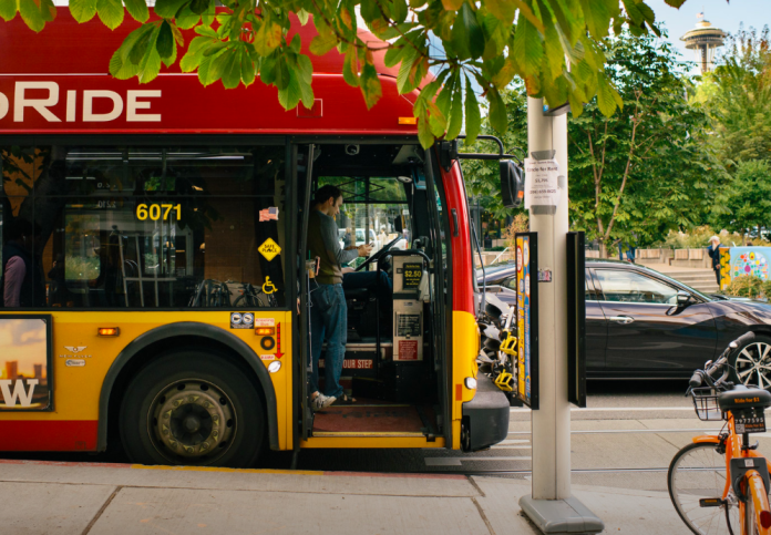 Screen Shot 2022-06-08 at 10.14.37 AM A man boards a rapid ride bus in Seattle