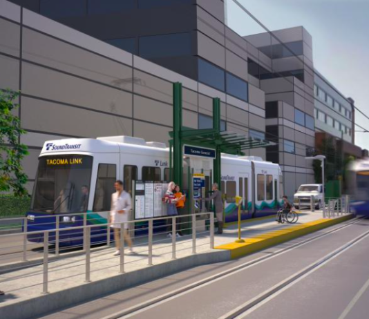 Explore Tacoma Link’s Hilltop Expansion with The Urbanist A rendering of an at grade light rail station with people waiting
