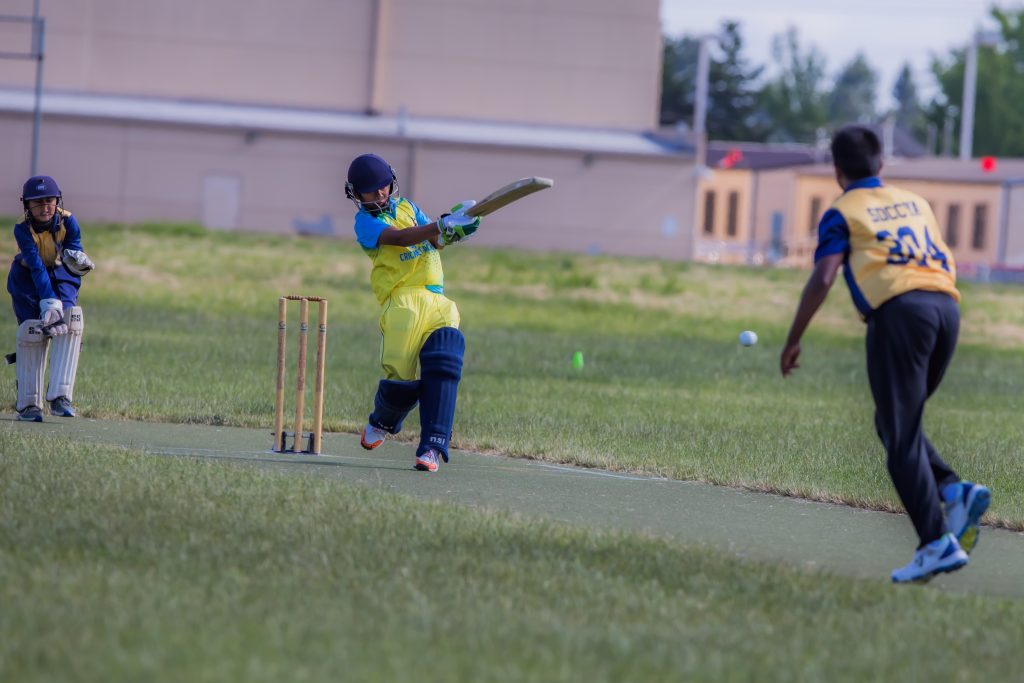 Young cricketers playing a game