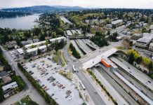 Mercer Island Plans to Densify Town Center… With a Big Catch Mercer Island's light rail station, in the median of I-90, being constructed. Parking lots and low density development is visible on the periphery