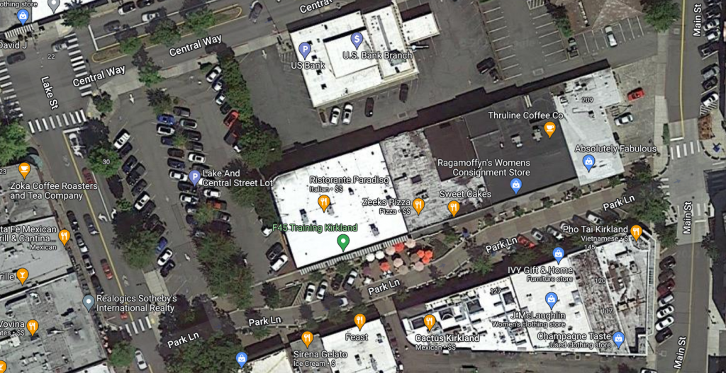 Google Maps satellite view of Park Lane, adjacent streets, and the off street parking lot
