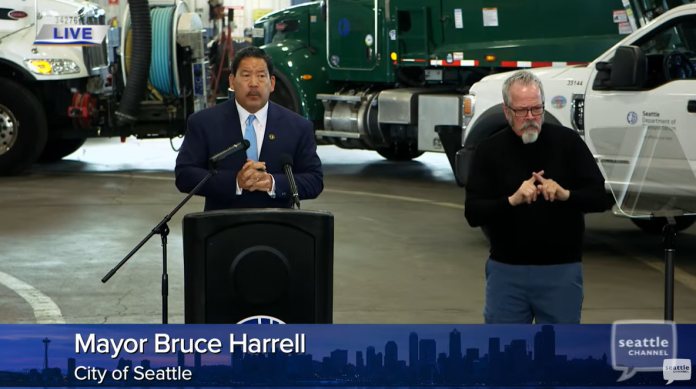 Mayor Harrell at podium for budget speech