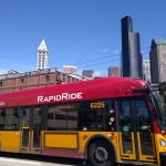 RapidRide bus with Seattle skyline