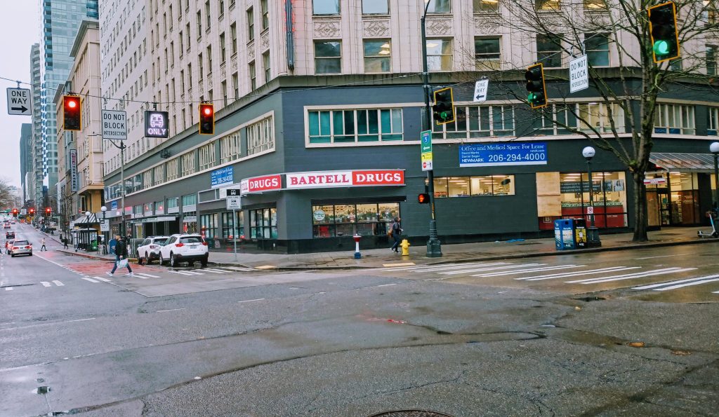 A wide intersection with signage warning not to block the intersection