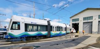 A streetcar vehicle rolls into a maintenance barn in Tacoma's facility.