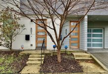 Republican Co-Sponsor Explains Why He Joined Missing Middle Housing Push two doors with addresses with a tree in the center and drive with garage in back