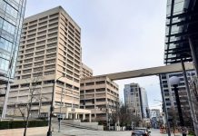 Sound Transit Board Backs Last-Minute Proposal to Skip Chinatown and Midtown Stations The view down 5th Avenue S with the King County Jail and skyway passage.