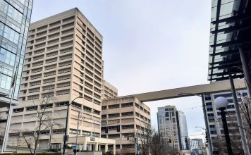 Sound Transit Board Backs Last-Minute Proposal to Skip Chinatown and Midtown Stations The view down 5th Avenue S with the King County Jail and skyway passage.