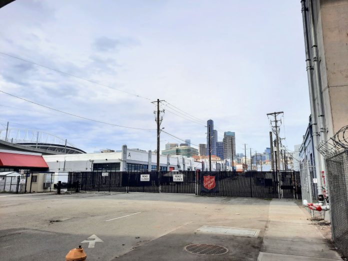 Salvation Army shelter with Seattle skyline 20230319_141828