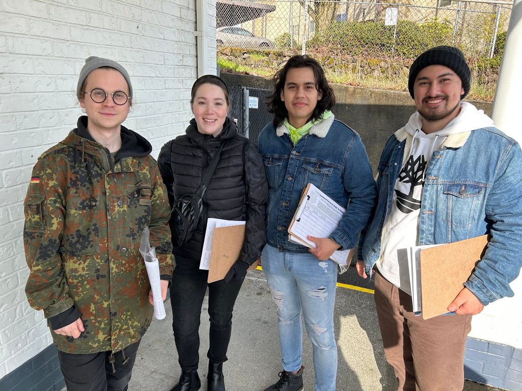 Four campaign canvassing volunteers.