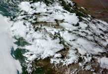 Climate Change is Influencing Seattle’s Unusual Spring Heatwave  Satellite photo of the Pacific Northwest with cloud cover on May 15, 2023