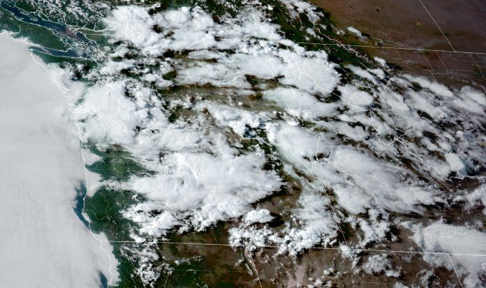 Satellite photo of the Pacific Northwest with cloud cover on May 15, 2023