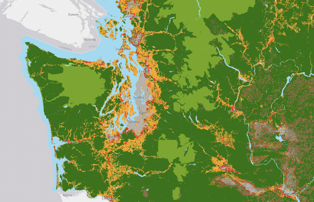 Wildfire risk map showing Puget Sound, the east Cascades, and central Washington. The red and orange areas around the Seattle metro area and in the east Cascade foothills are at highest risk in 2023.