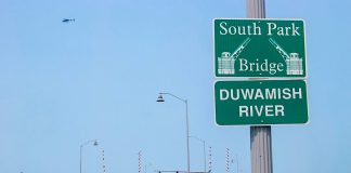 Dumptruck crossing the Duwamish River Highway overpass.