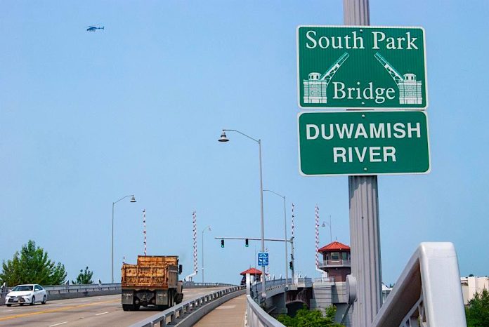 Dumptruck crossing the Duwamish River Highway overpass.