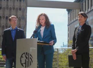 Seattle Drug Ordinance Fails to Meet Treatment Promises, Report Says The King County Jail and Administration Building is the backdrop for the press conference.