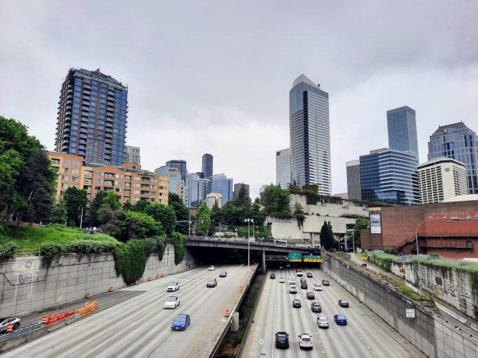 Seattle Skyline with I-5 trench and Freeway Park overhead.