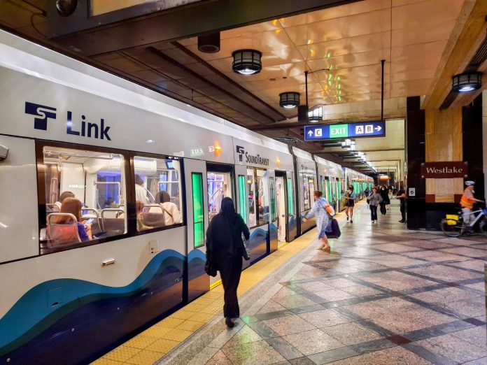 Passengers board and disembark at Westlake Station's northbound platform.