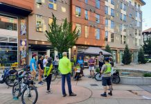 Advocates Advance ‘Pedestrianize This’ Campaign, Is SDOT Ready to Listen? A dozen people gather in the courtyard plaza between the buildings that compose El Centro de La Raza complex.