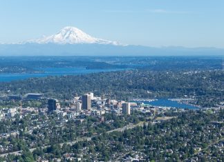 PSRC Report Connects Single Family Zoning and Highways with Structural Racism Aerial of the Central Puget Sound with its many highways and single family homes