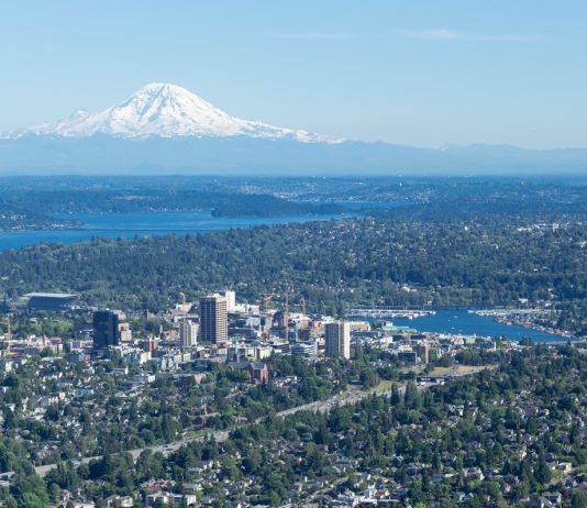 PSRC Report Connects Single Family Zoning and Highways with Structural Racism Aerial of the Central Puget Sound with its many highways and single family homes