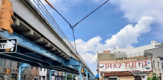 Steel girders painted blue support the elevated rail line in Philly's Fishtown neighborhood.