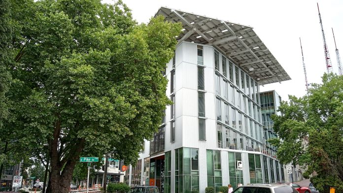 Street view of the white six-story Bullitt Center.