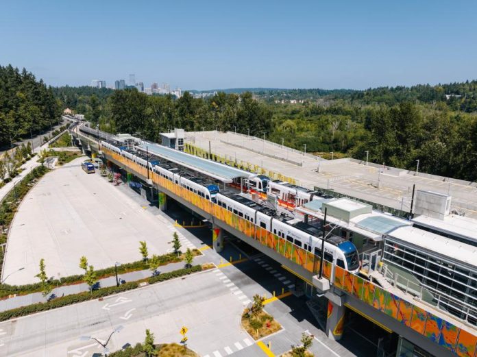 The elevated South Bellevue Station with the Bellevue skyline in the distance.