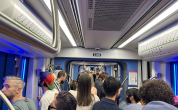 Sound Transit Braces for Overcrowding As It Launches Lynnwood Link in 2024 Crowds waiting at a light rail transit station.