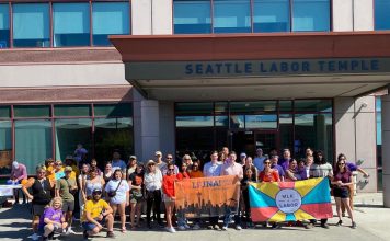 Urbanist Action: Volunteer to Put Our Candidates Over the Top Color banners head by campaign volunteers for MLK Labor canvases.
