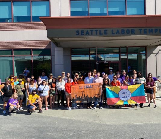 Urbanist Action: Volunteer to Put Our Candidates Over the Top Color banners head by campaign volunteers for MLK Labor canvases.
