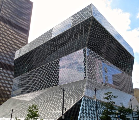 Seattle’s Public Libraries Chart a New Strategic Direction Seattle Central Library is a glassy modernist building that cantilever out at the top.