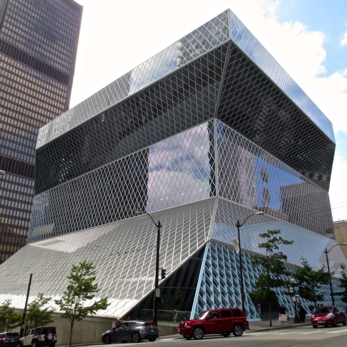 Seattle Central Library is a glassy modernist building that cantilever out at the top.