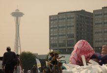 Seattle Plans Resilience Hub Program Expansion with Climate Change in Mind Space Needle and a wildfire smoky sky.