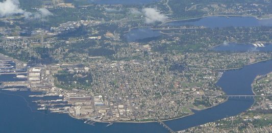 An aerial photograph shows the port city of Bremerton from a height of nearly 10,000 feet.