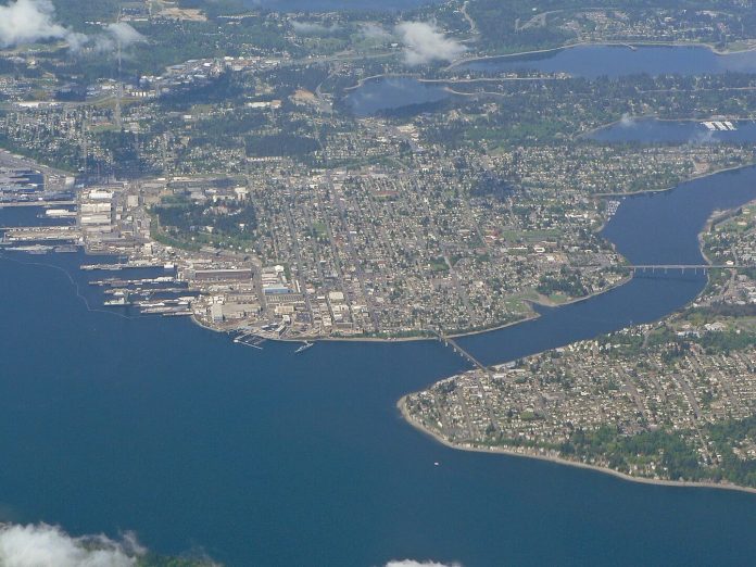 An aerial photograph shows the port city of Bremerton from a height of nearly 10,000 feet.