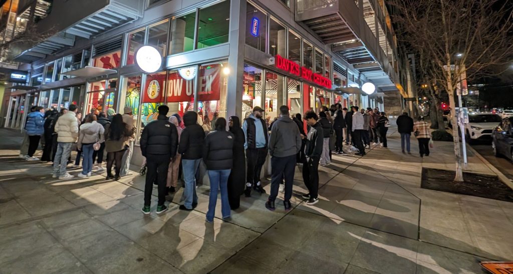 A wide angle shot shows the wide sidewalks.