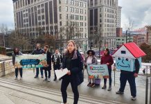 How Seattle Social Housing Advocates Campaigned to Victory Social housing advocates stand on the steps of Seattle City Hall with their house mascot.