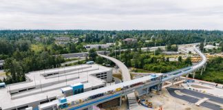 Lynnwood Link Light Rail Will Open August 30 A bird's eye view of an elevated station and parking garage.