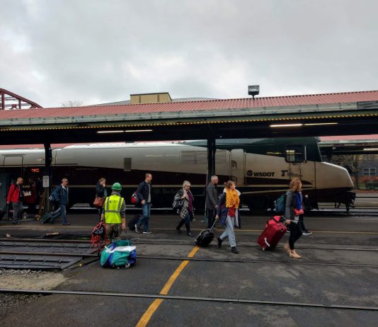 State Lawmakers Chart Path to Double Amtrak Cascades Service Passengers deboarding an Amtrak train at Portland's Union Station.