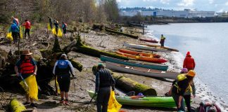Community Development Counters Eco-Gentrification from Duwamish Valley Cleanup Kayaks beached among the driftwood along the Duwamish River