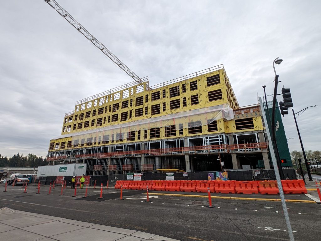 An under construction apartment getting its framing done