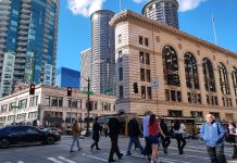 State Safety Plan Recommends Lower DUI Limit, Driver Education Reforms A crosswalk is filled with a dozen pedestrians in downtown Seattle.