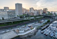 New Tacoma Waterfront Park Begs for I-705 Freeway Removal An aerial photo shows Tacoma's waterfront separated from its downtown towers by its elevated I-705 freeway.