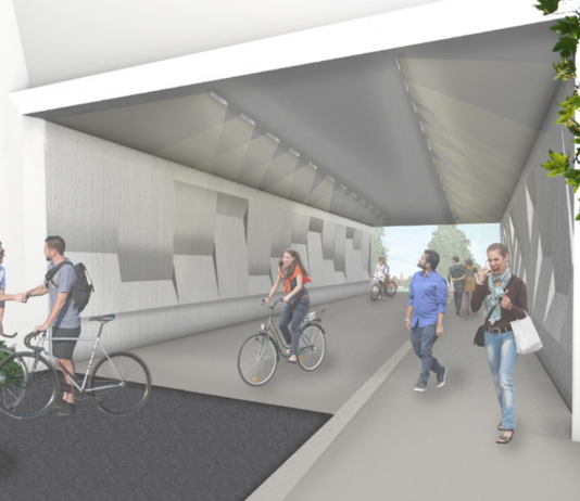 Trail Tunnel Added Back to 520 Lid Plans After WSDOT Reversal A rendering shows three people biking and three walking on the trail through the tunnel.