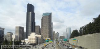 Op-Ed: Seattle Transportation Levy Should Seek to Undo Harm from Highways The Seattle skyline rises above the I-5 freeway trench in South Downtown.