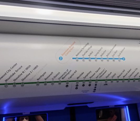 Sound Transit Adds Lynnwood Link to System Diagrams, Anticipating August Opening Above Link train doors are a simple map of stops with station names and numbers listed.