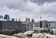 Seattle’s Population Nears 800,000 in Latest State Tally The Space Needle is visible in the distance between towers from a South Lake Union roofdeck.