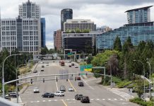 Op-Ed: Bellevue Can Lead the Region on Street Safety A high angle view of wide, car-choked 8th Avenue looking toward I-405 and the towers of Downtown Bellevue.