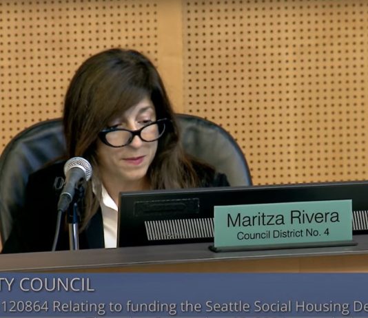 Seattle Council Puts Competing Measure Against Social Housing on February Ballot Rivera sits at the dais at council chambers.